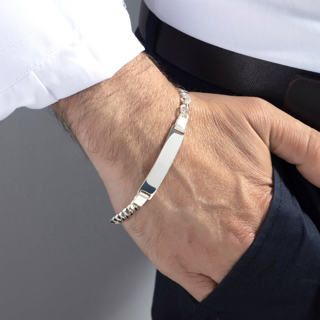 Men's sterling silver Cuban curb chain ID bracelet with engraved name plate, crafted in the Artizian studio