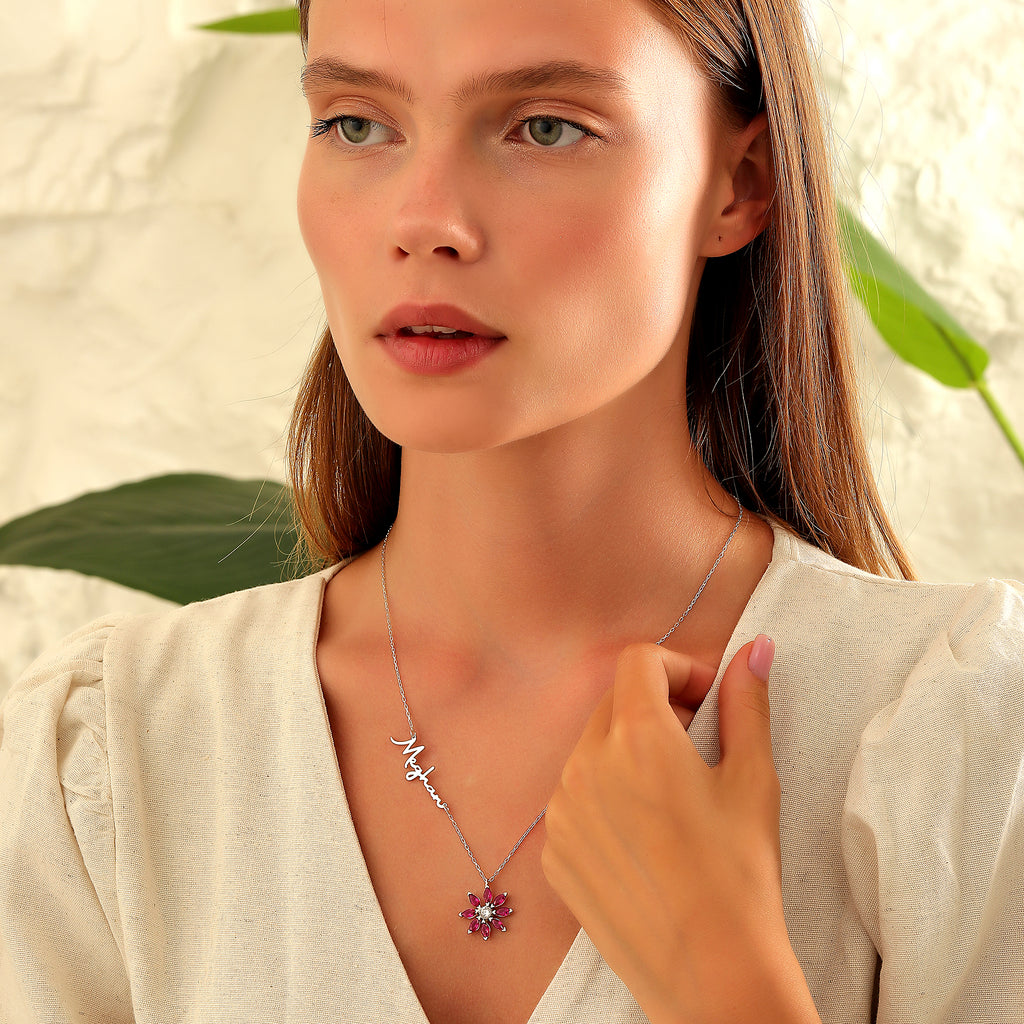 Name necklace with birth flower birthstone charm, crafted in the Artizian studio