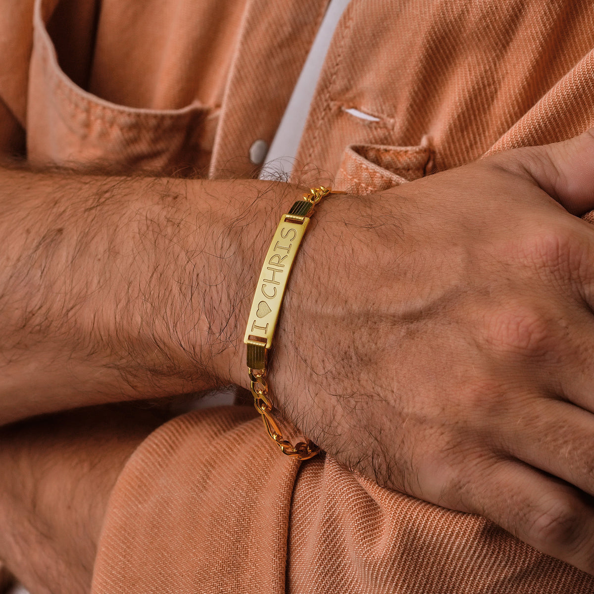 Men's sterling silver Figaro ID bracelet with engraved name plate, crafted in the Artizian studio