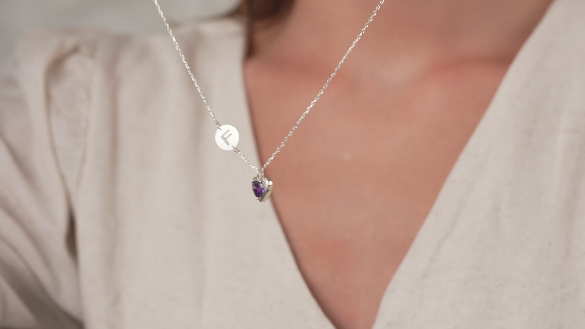 Video of Initial Necklace with Heart Birthstone, handmade and engraved by Artizian