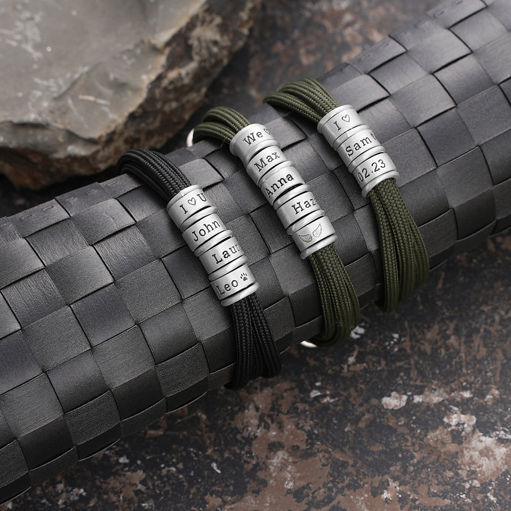 Men's paracord bracelet with personalized engraved beads, handmade by Artizian