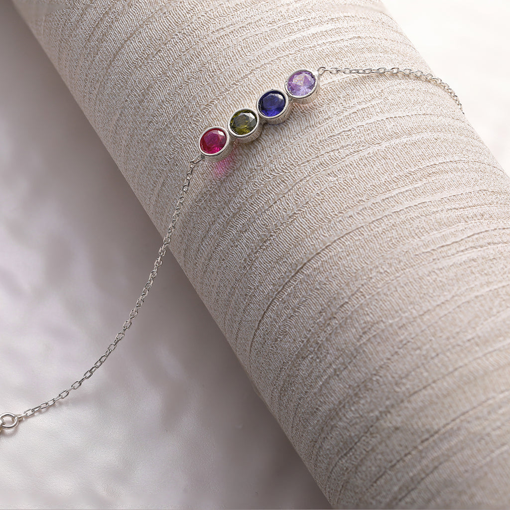 Dainty 925 sterling silver birthstone bracelet with circle charms, crafted in the Artizian studio