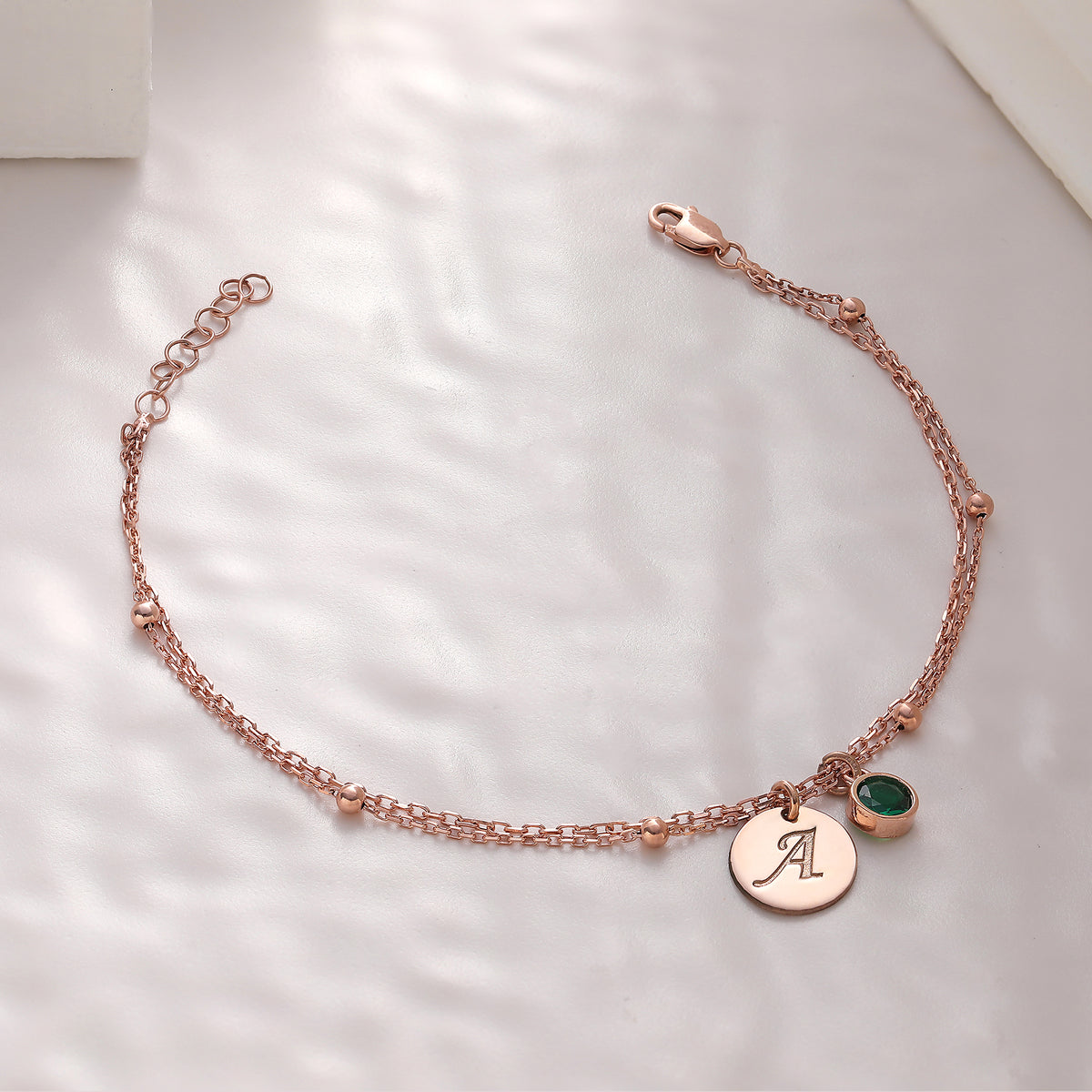 Custom birthstone bracelet with initials, crafted in the Artizian studio